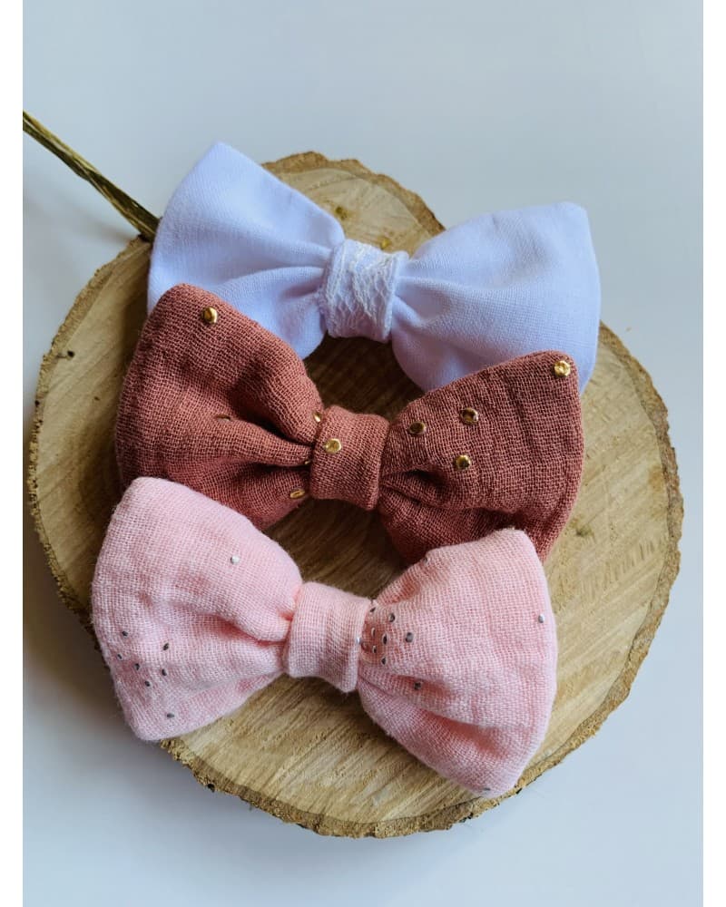 Trio barettes noeuds rose